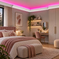 Elegant bedroom with ACL-006 LED crown molding and soft pink indirect ceiling lighting