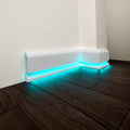 ASL-001 white LED baseboard molding with bright turquoise indirect floor lighting