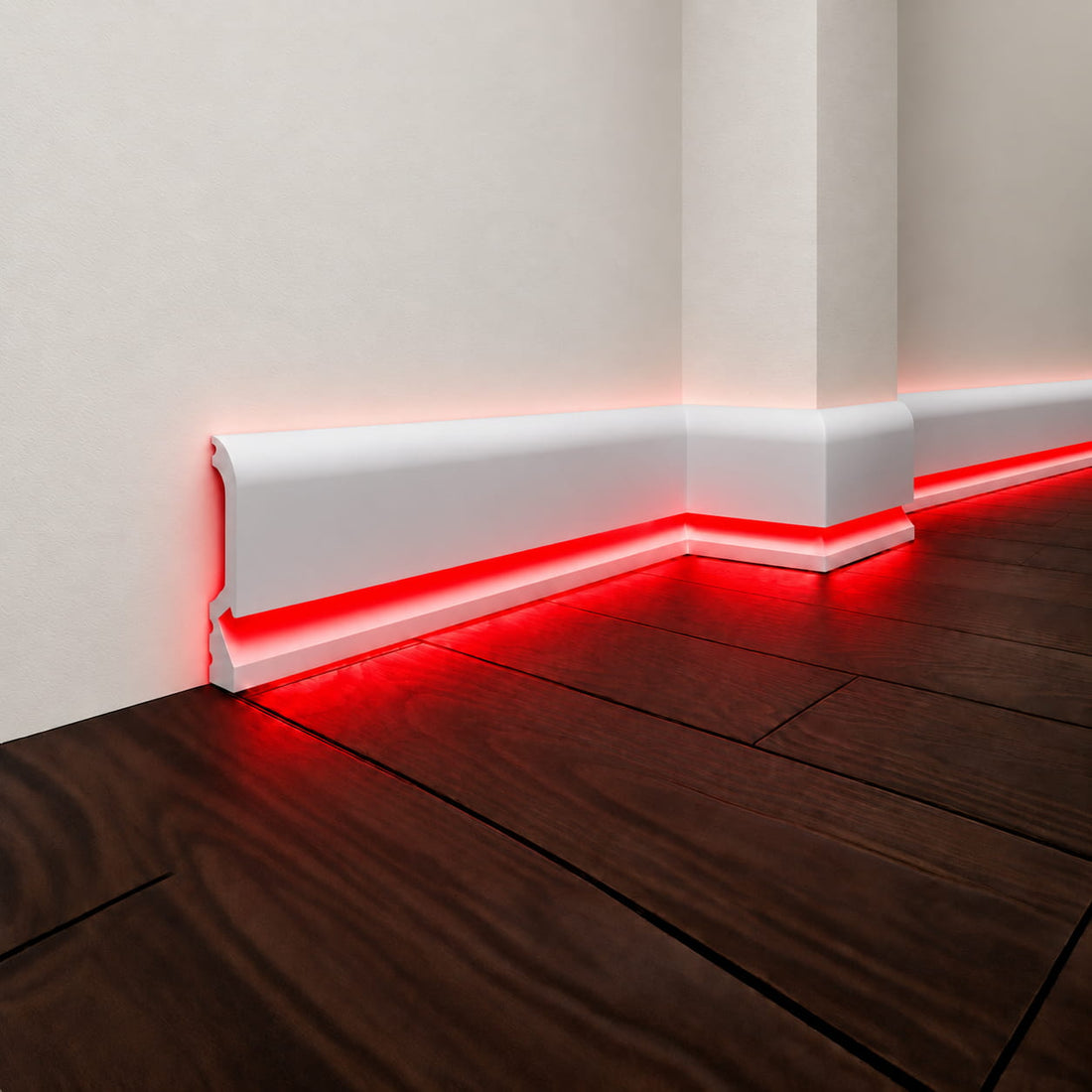 ASL-001 white LED baseboard molding with intense red indirect lighting reflected across dark wood flooring
