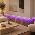 Modern interior featuring ASL-002 LED baseboard with continuous purple ambient lighting along the walls