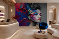 Beauty salon wall mural with a colorful abstract woman portrait installed behind a luxury spa reception desk and modern waiting lounge.