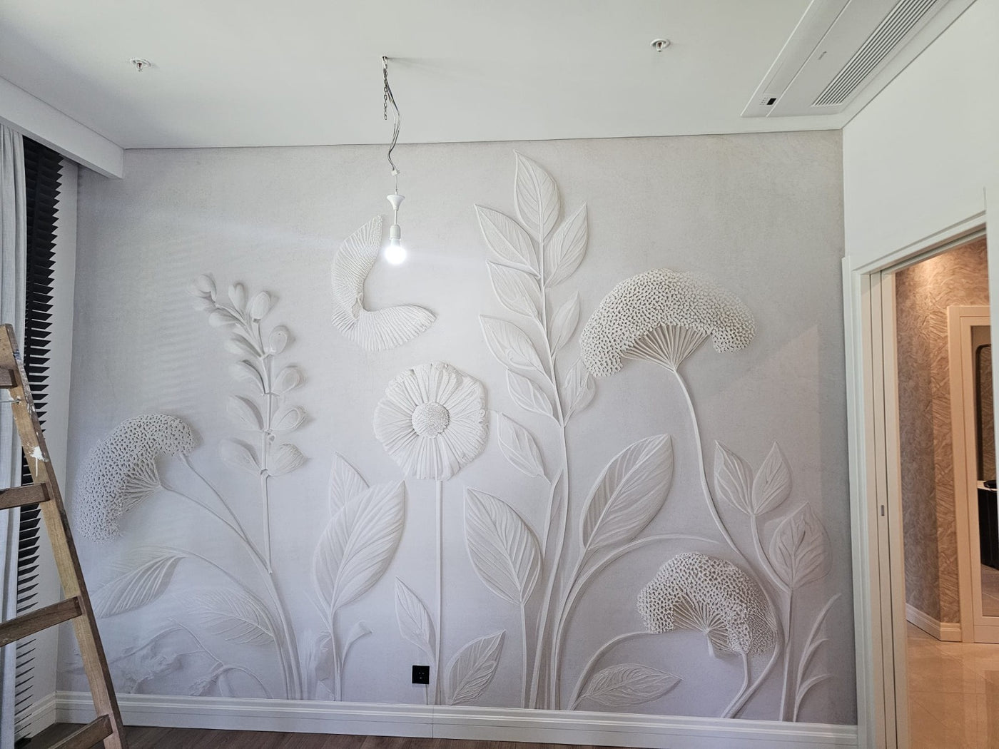 Real botanical relief with sculpted depth.